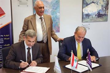 MOU between Azm University                                                                                                                                                                                                                                and Dar el Elm w Olama